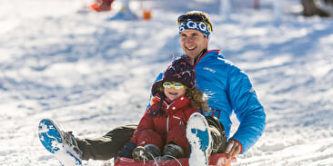 Tubing und gezogener Schlitten im Champ du Feu